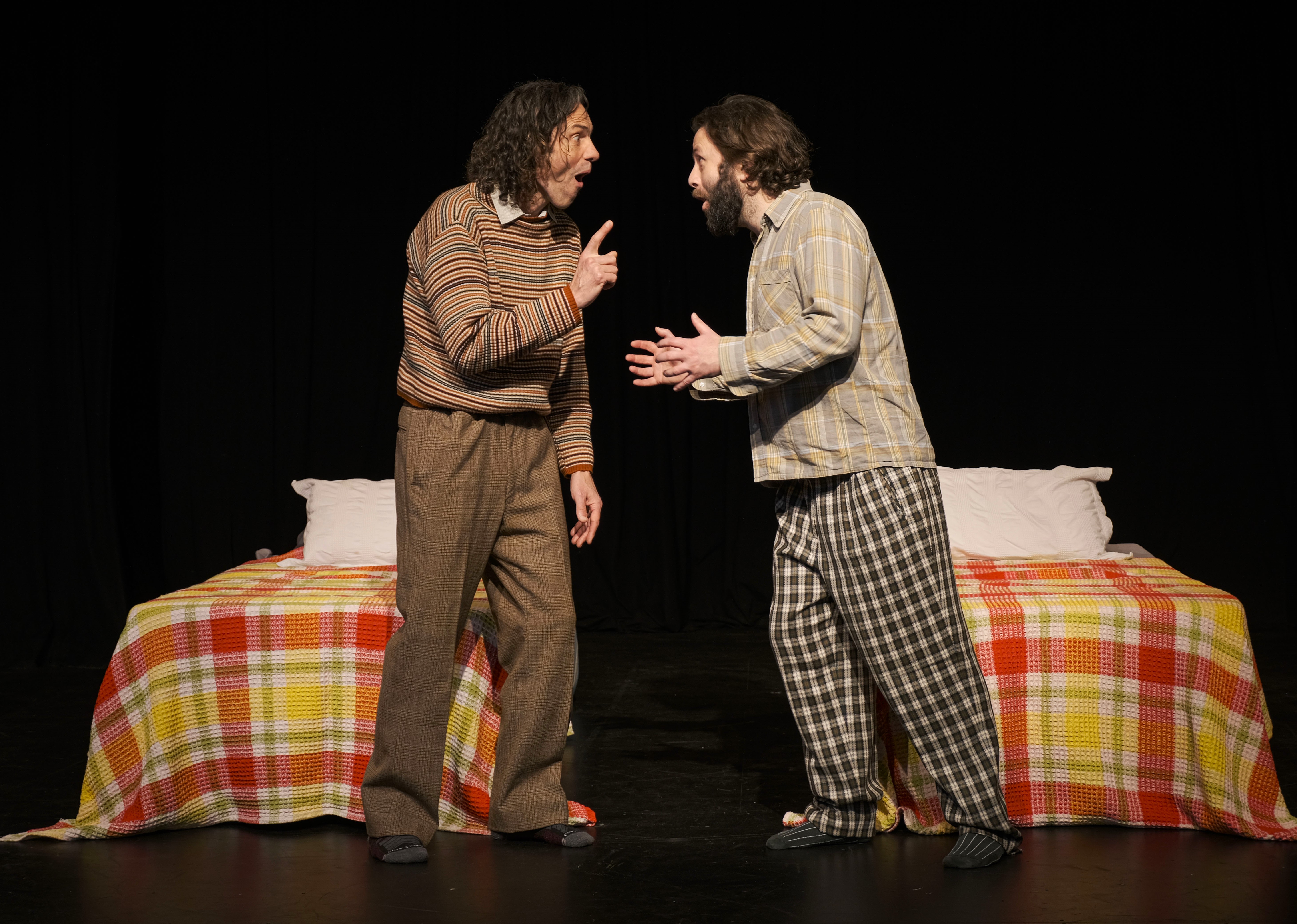 Elling and Kjell Bjarne talking between the two beds in their Oslo apartment.